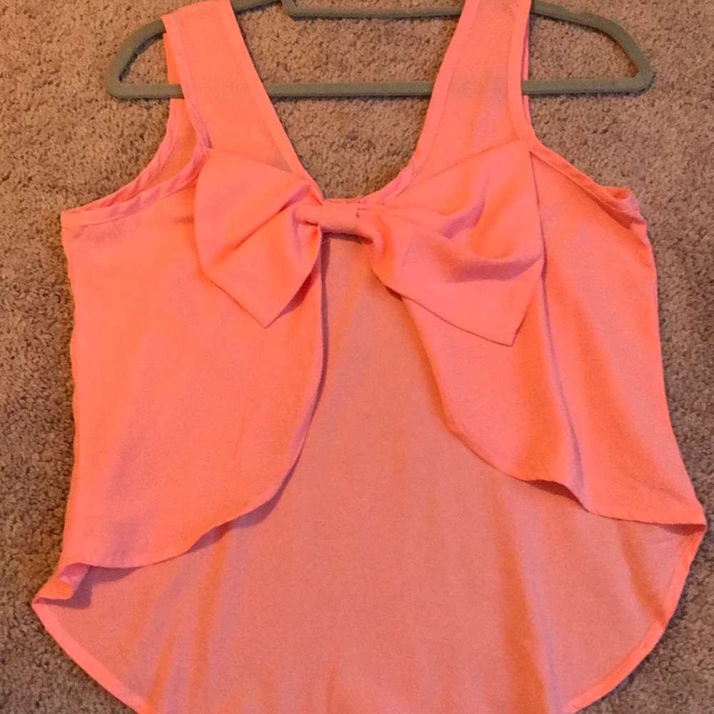 Pink cut out back with bow tank top